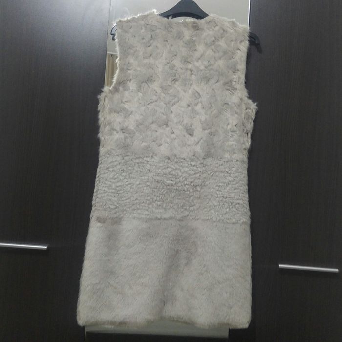 Дълъг пухкав елек