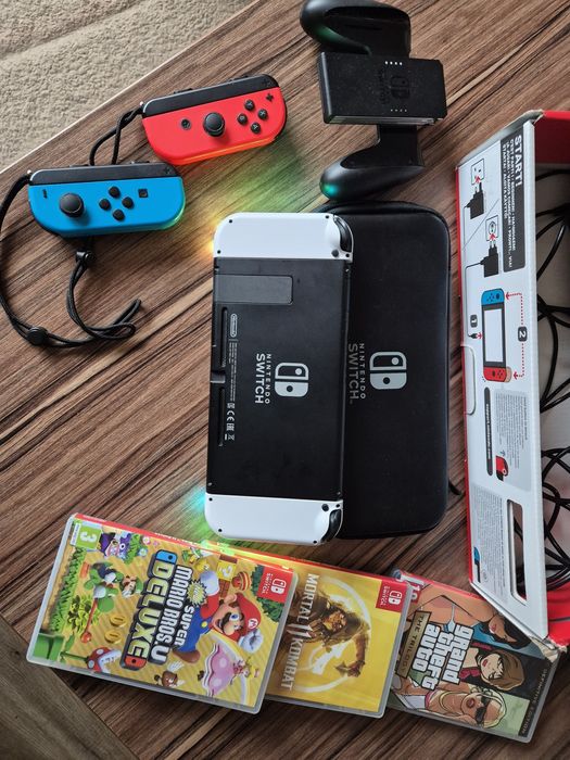 Nintendo Switch пълен комплект + игри