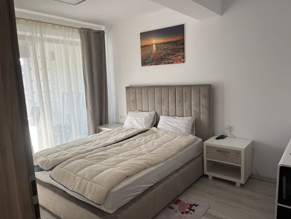 Inchiriez Ap 2 camere , 65 m2 , bloc nou , garaj privat   subsol