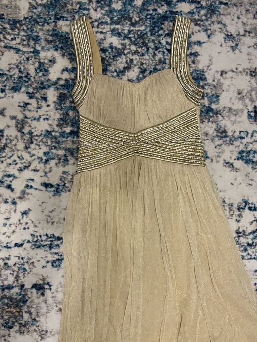 Продаю платье блестящее