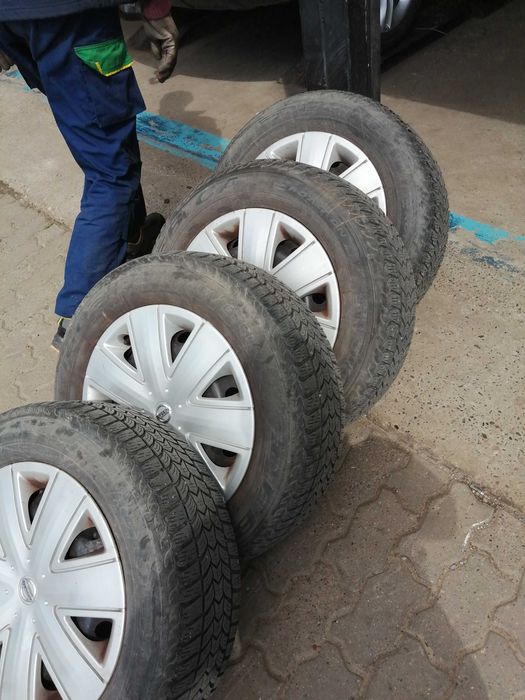 Jante tablă Nissan Qashqai J10 16” + anvelope iarnă + capace originale