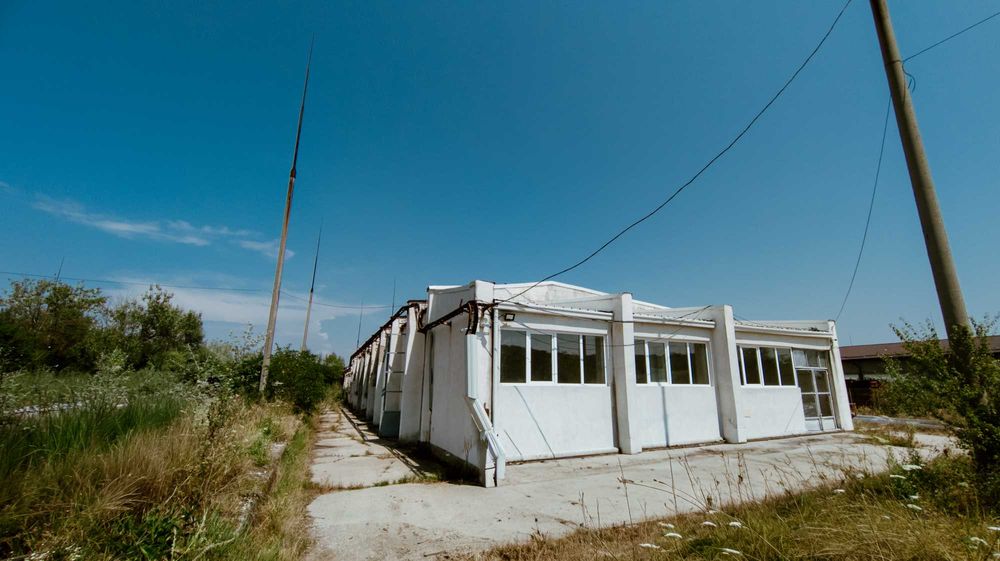 Proprietate industrială de vânzare – Teren 10.314 mp + hale 1.063 mp – Băbeni, Vâlcea – 250.000 €