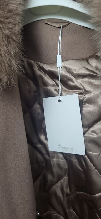 Продам пальто новое