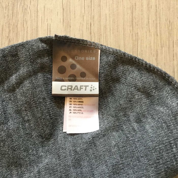 НОВА 100 % оригинална зимна плетена сива шапка CRAFT / Крафт за ски