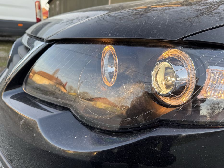 Vand faruri Passat b6 cu angel eyes perfecte ca noi!