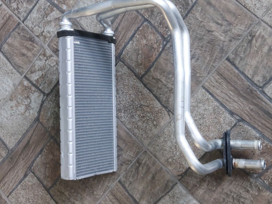 Радиатор печки Sybaru Outbask 2012  год .