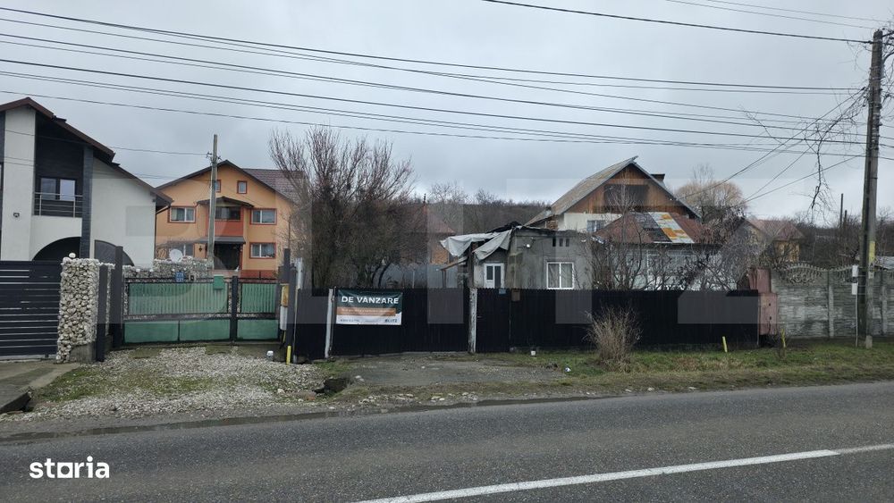 Casa cu acoperisul ars cu teren intravilan, 764 mp, zona Razvad