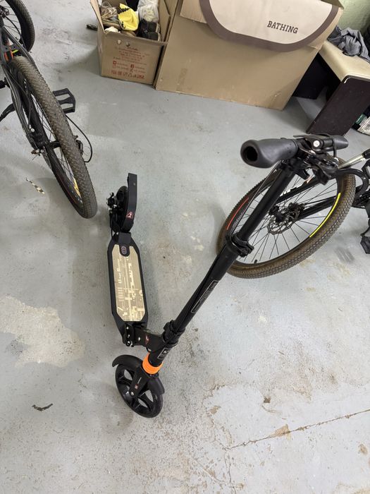 Самокат с двумя амортизаторами