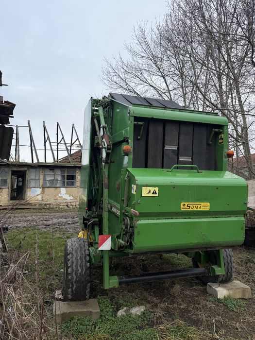 Presa John Deere 550