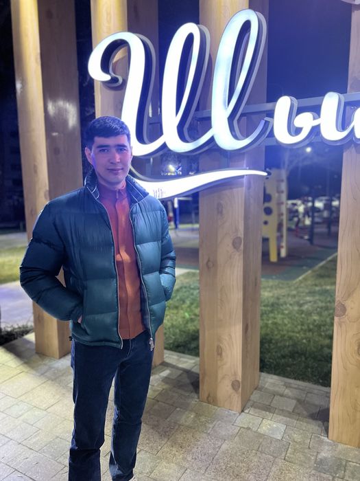 Пуховик от бренда ARMANI EXCHANGE