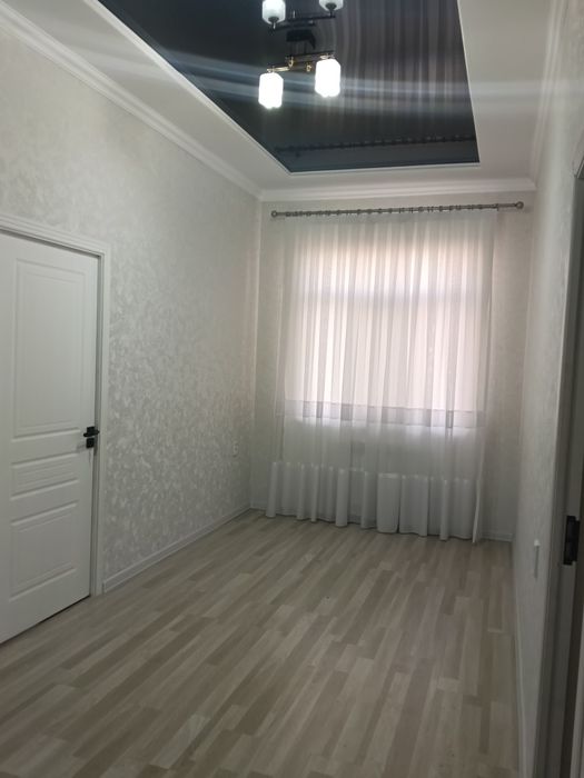 Продается двух этажный дом в махалле Мажнунтол