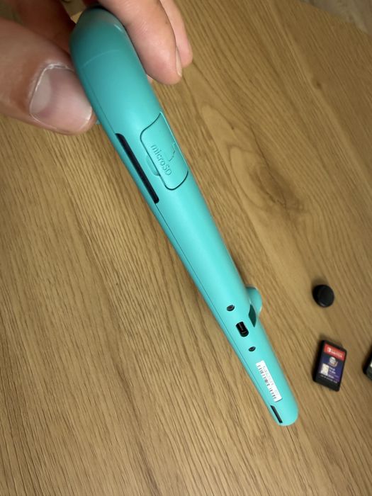 Nintendo Switch Lite тюркоазен + 3 игри + калъф