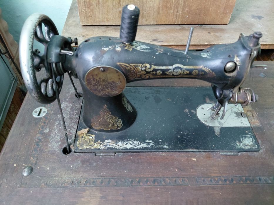 Masina de cusut signer
