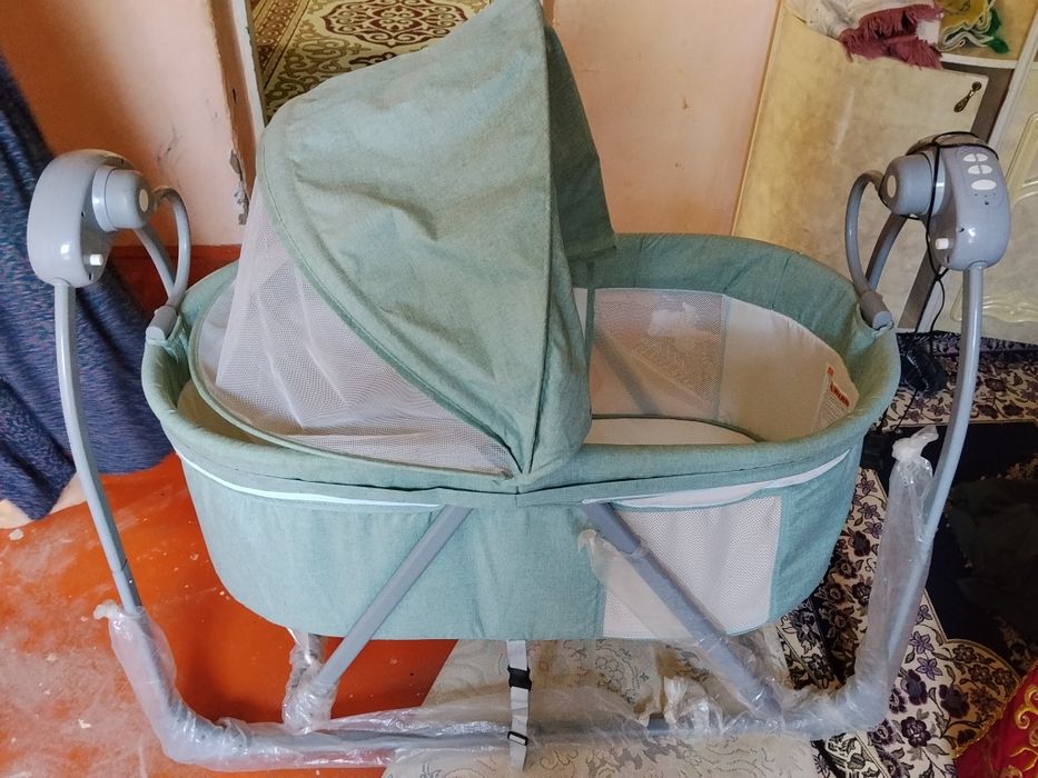 Детская кроватка качалка