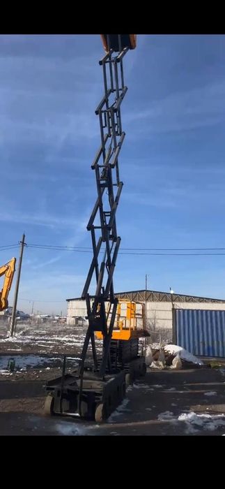 Продам ножничный подъемник