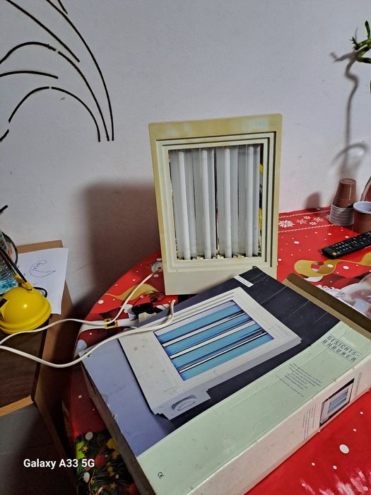 Aparat de bronzat facial