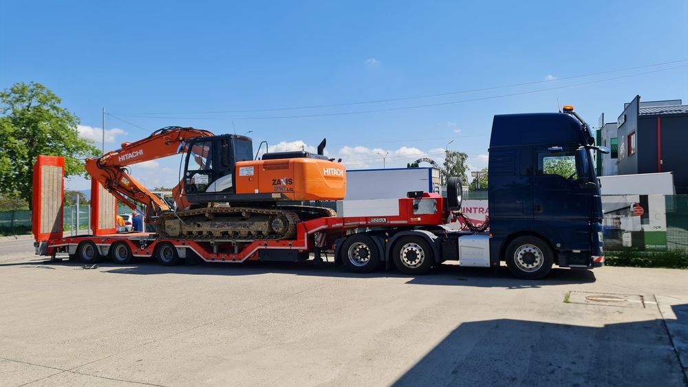 Transport utilaje,marfa trailer agabaritic