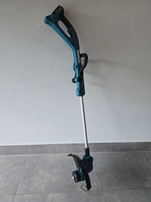 Motocoasa trimmer electric de gazon Makita DUR193Z 18v pe baterie