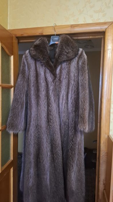 Зимняя  енотов шуба.