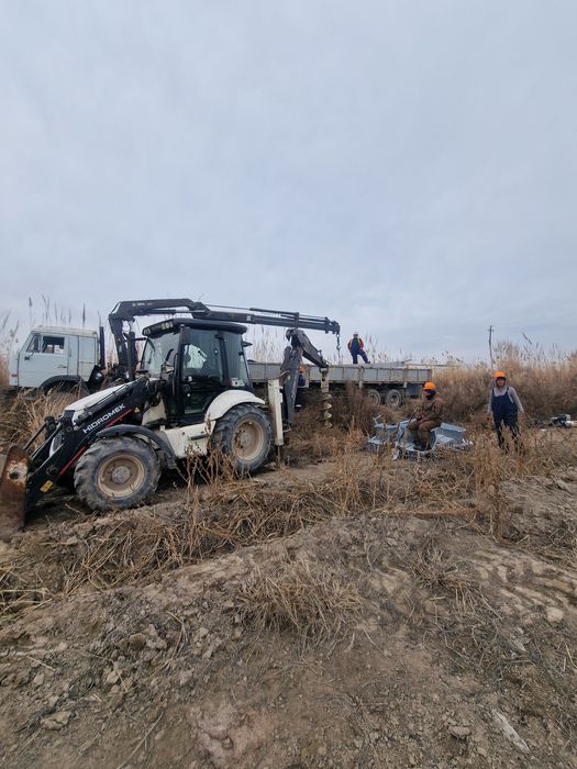 Услуга ямобур трактор три в один