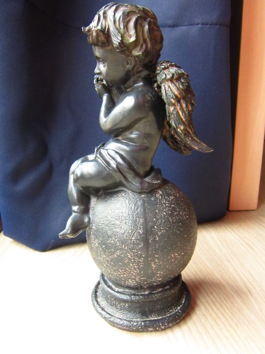 cadou rar  inger  pe sfera  made in Germany