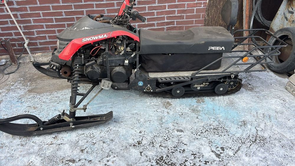 Продам снегоход snowmax