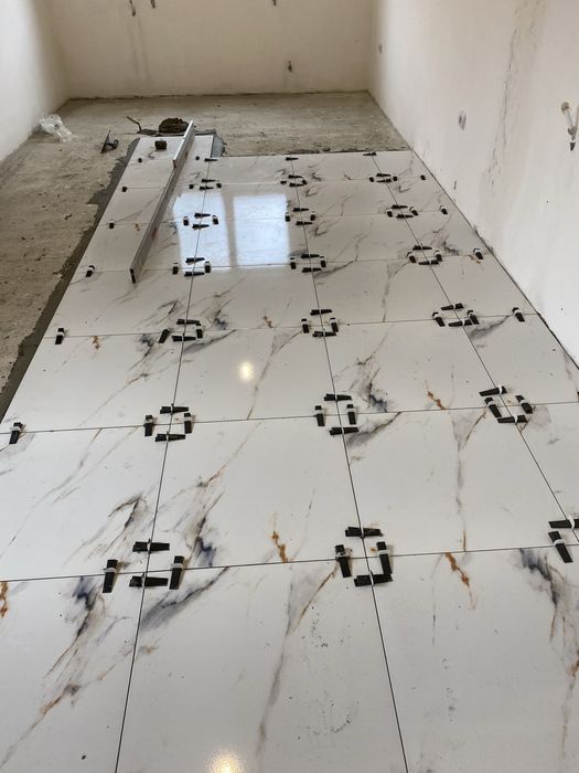 Finisaje interioare.Gresie,faianta,parchet,rigips,glet,lavabila.