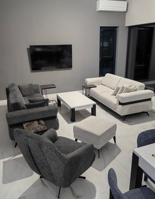 Два дивана троика, кресло и табуретка.