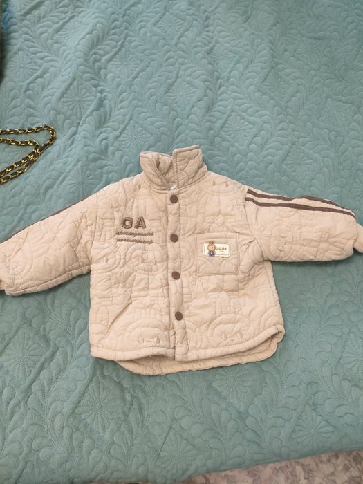 Продам детские куртки и комбинезоны