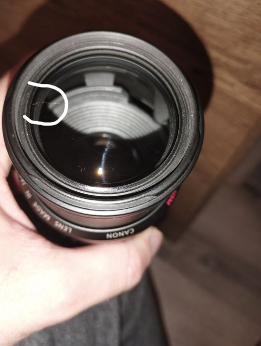 Canon EF 55-200mm f/4.5-5.6 II USM si Olympus 14-42mm f/3.5-5.6 EZ ED