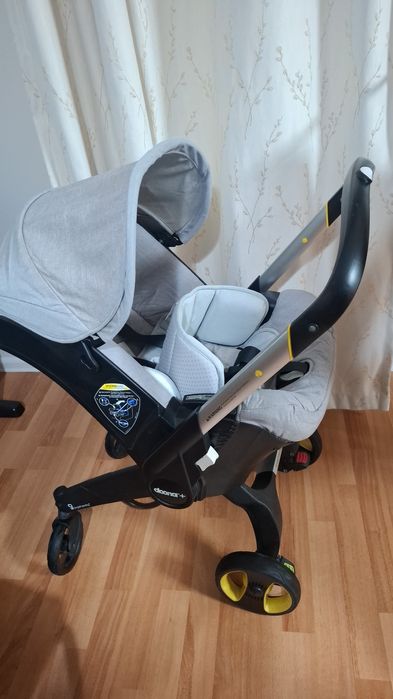 Продам кодяску + автокресло Doona +