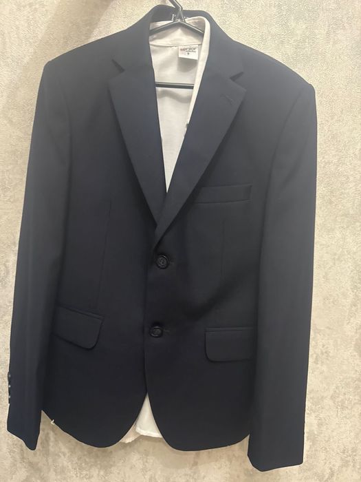 Костюм темно синии новый