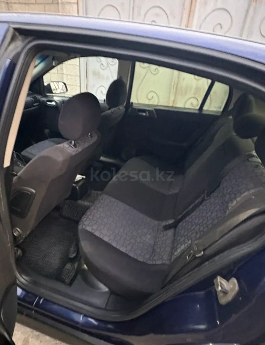 Опель астра машина