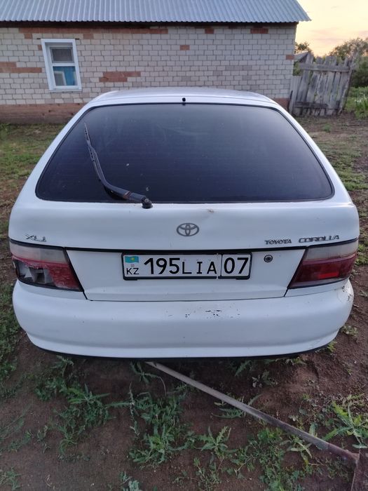 Тойота корола е100