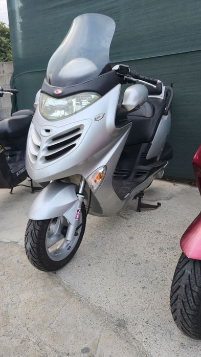 SCUTERE  49 și 125cc Yamaha Kymko