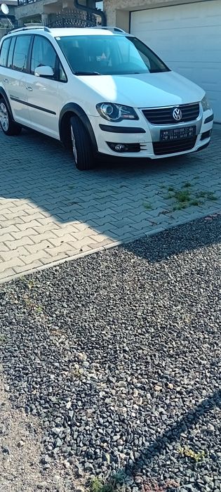 Vând  Vw Turan  cross  an 2009  ,7 locuri Facelift   crom