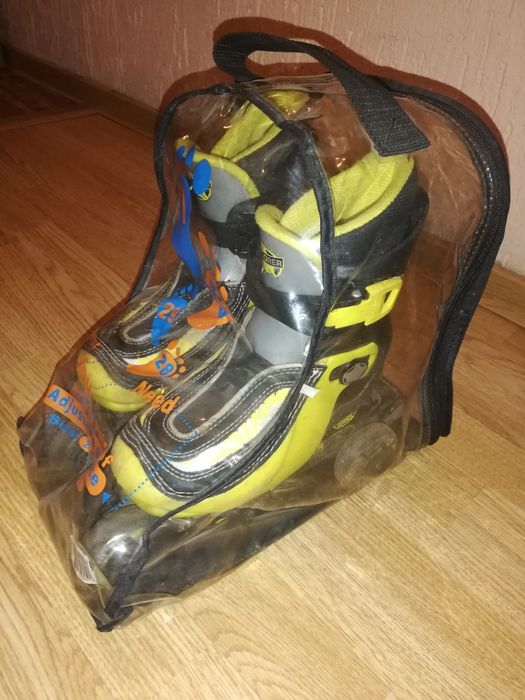 Роликовые коньки