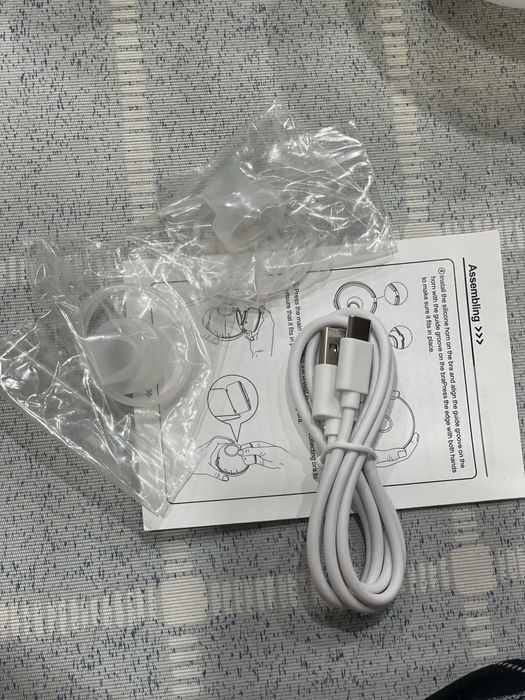 Продам Электрический Молокоотсос 2шт.