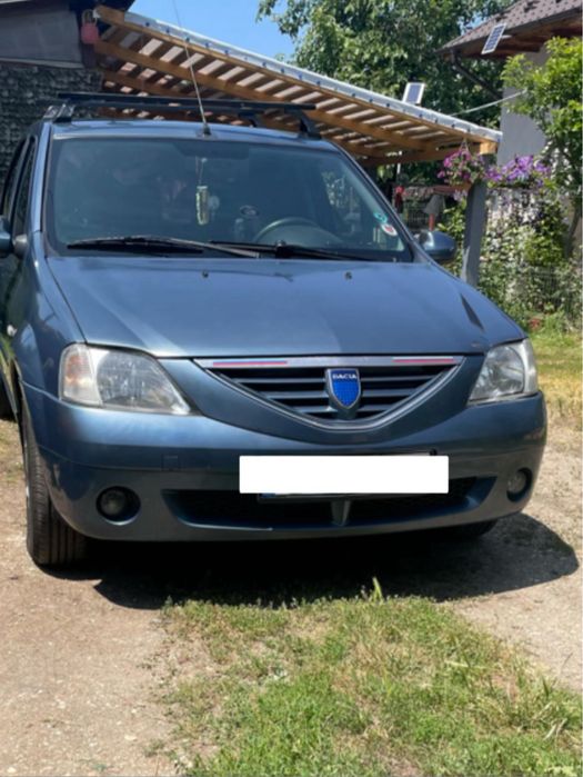 Dacia Logan, 1.6 16V • 2006 • 180.000 KM • Albastru • Navigație