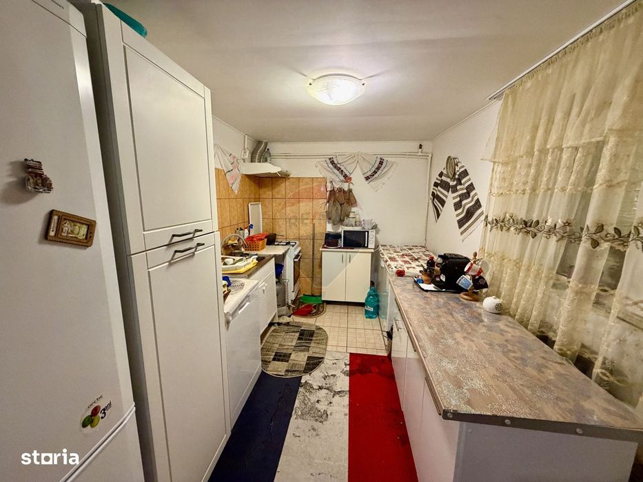 Casă cu teren si demisol In Tifesti