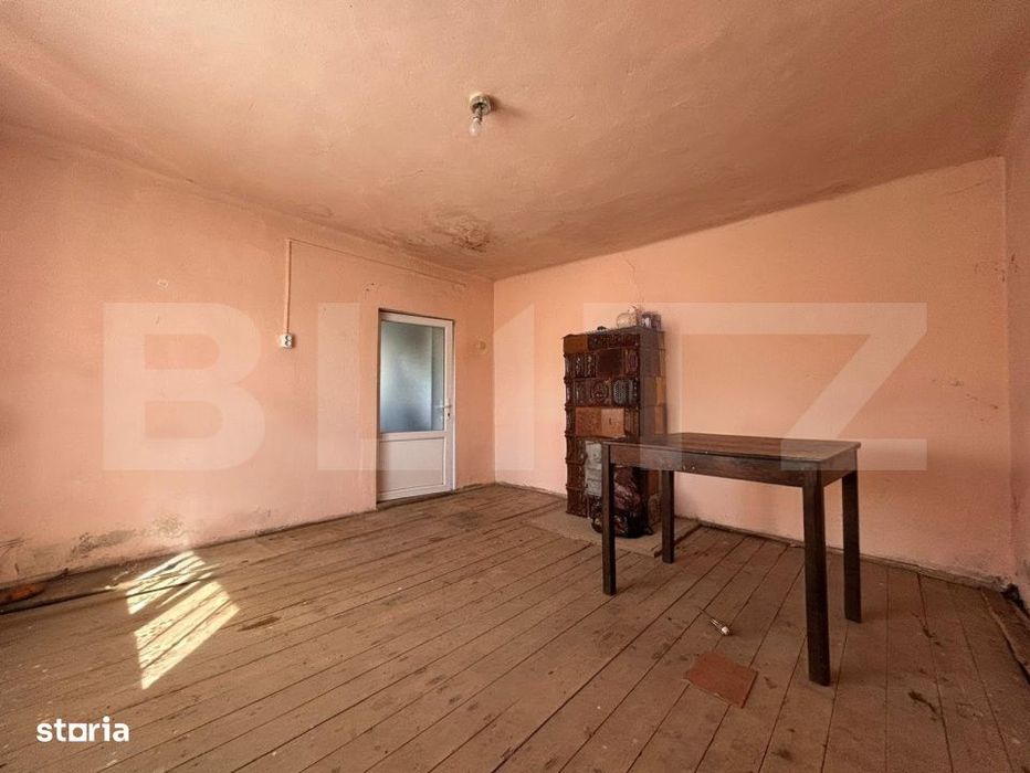 Casa cu teren generos de 1100 mp in Comuna Mica – ideala pentru inve