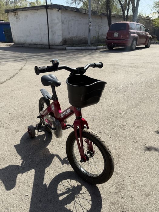 Велосипед BATLER в отличном состоянии. Колеса 14 дюймов