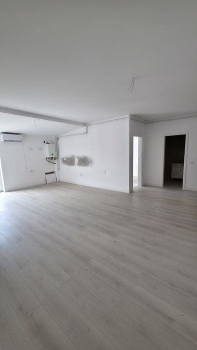 Apartament 2 dormitoare, 2 bai, bucatarie openspace cu living