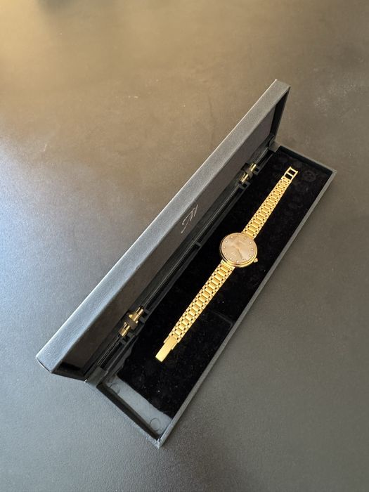 Часы золотые 750