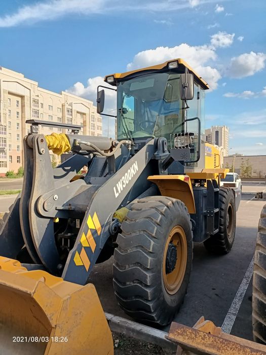 Услуги фронтального погрузчика.