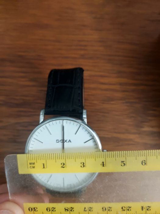 Vând două ceasuri Doxa și Atlantic