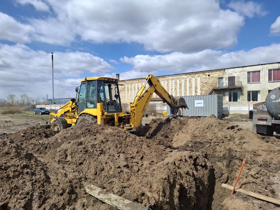 Услуга аренда экскаватор-погрузчика