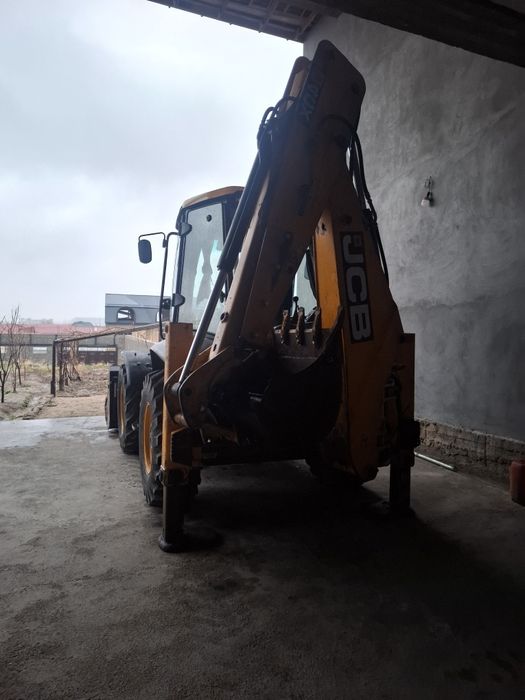 JCB 4CX погрузчик экскаватор