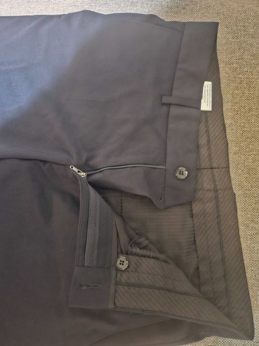 Pantaloni de stofă, mărimea 46(S), în stare bună fără defecte.