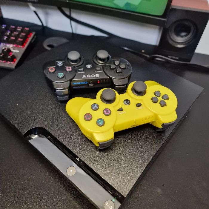 Playstation 3 slim modat Hdd 320gb 2 manete PS3 43 jocuri